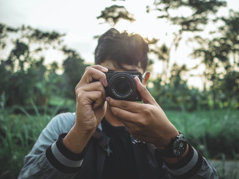 boy taking a photo